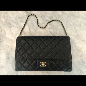 Chanel black caviar clutch on a chain